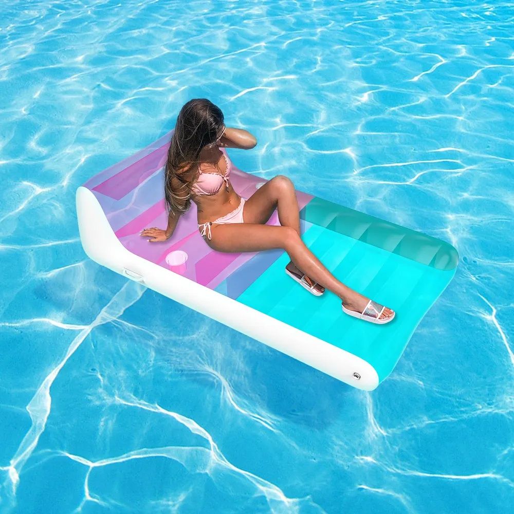 inflatable pool float, beach lounger mattress, transparent pool float, blue and pink inflatable float, water toys, floating pool mattress, ride-on pool float, summer water fun, PVC inflatable float, pool party accessories, beach vacation float, durable pool float, easy inflation float, relaxation pool lounger, stylish swimming float.